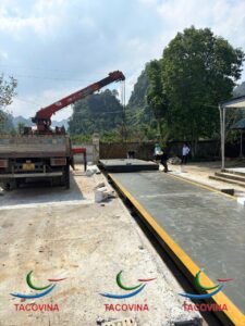 LẮP ĐẶT BÀN CÂN 100 TẤN KÍCH THƯỚC 18M X 3M VÀO VỊ TRÍ MÓNG